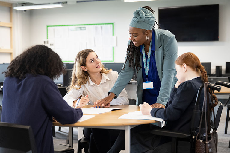 Teacher helping students of all abilities